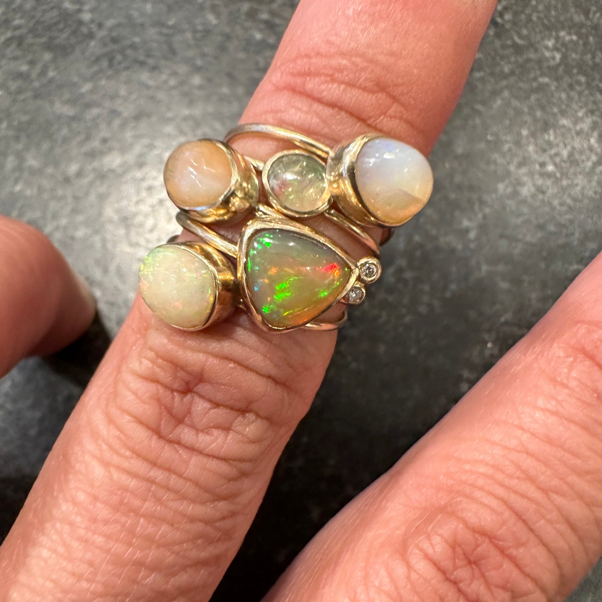 Simple opalescent Mexican opal and gold ring